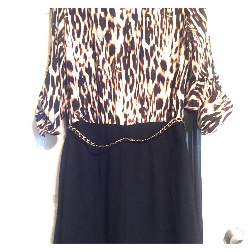 Romper, top is cheetah print, black shorts